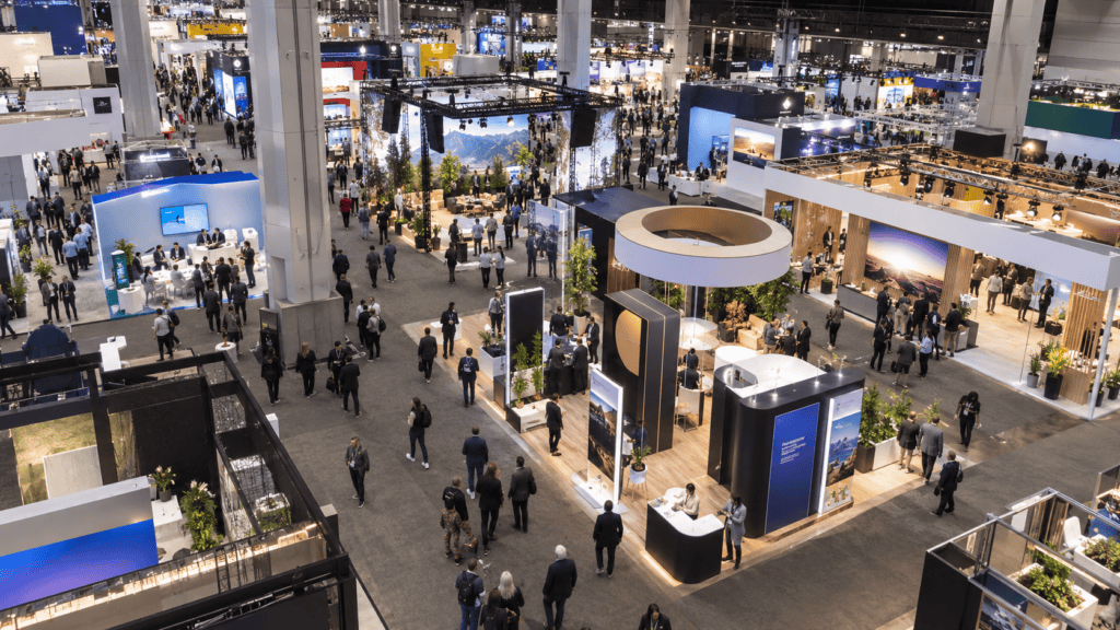 Tradeshow shipping event floor with exhibit booths and attendees at a convention centre